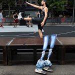 Inclusive Basketball Court Celebrating Community and Accessibility Inclusive basketball court with prosthetic legs symbolizing accessibility and community sports culture.